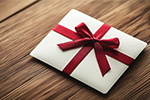 Geschenkumschlag mit Schleife
